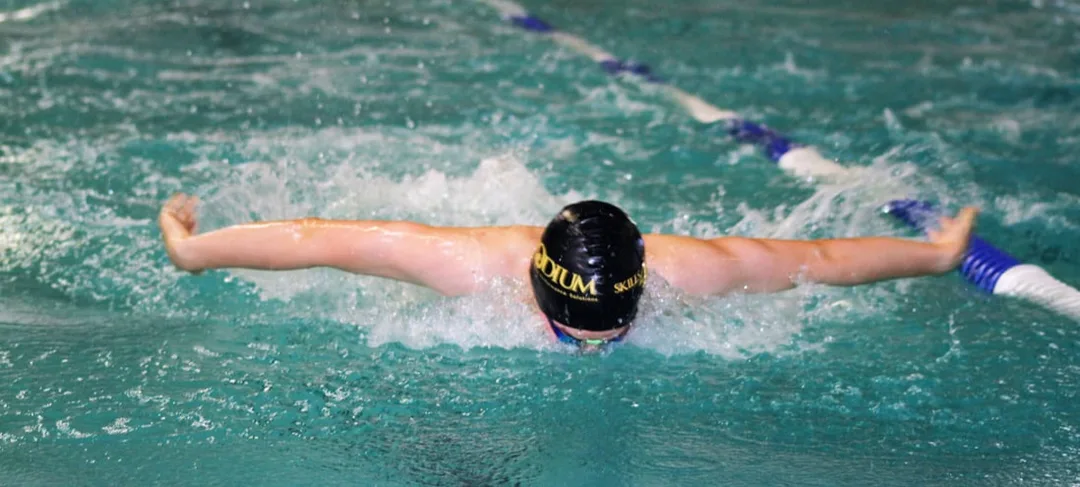 Competitive National swimmer practicing butterfly technique  during a Skills4Podium master class.